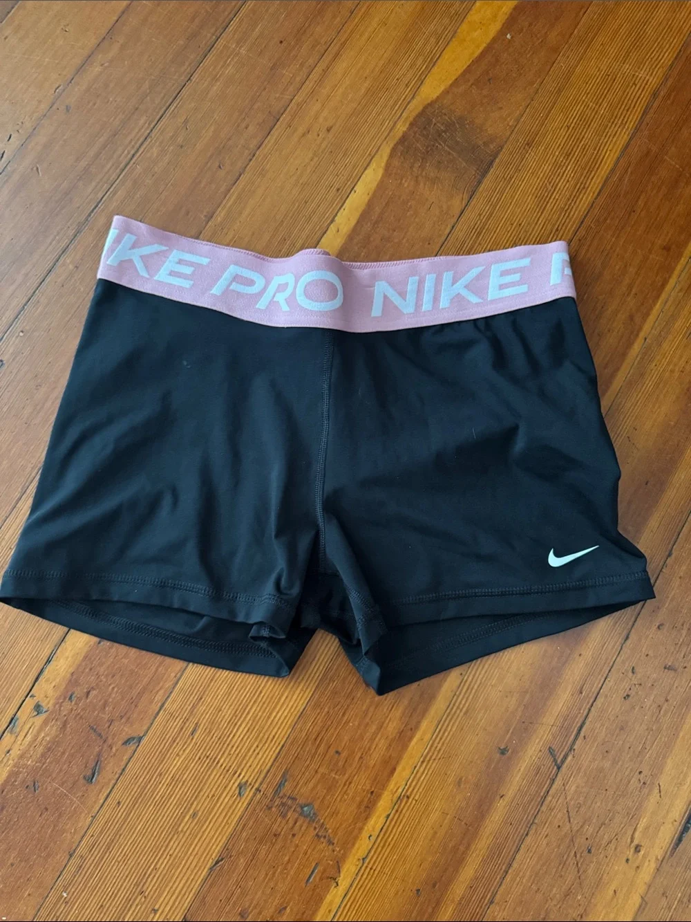 Nike Women's Black Athletic Shorts with Pink Branded Waistband